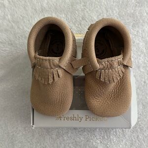 Freshly picked new weathered, brown Moccasin Baby Shoes size 5. Worn once